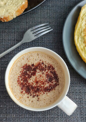 a cup of coffee with chocolate chips