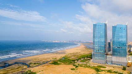 a wonderful twin tower at Sea view in Karachi, Pakistan. - obrazy, fototapety, plakaty