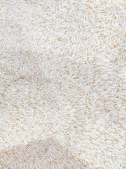 Rice texture. Basmati rice grains background.