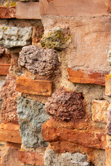Close-up fragment of medieval wall (ilmen shell limestone, material of old Novgorod architecture). Selected focus, material or textures concept