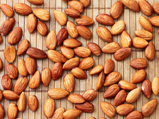 Almonds on a wooden surface.