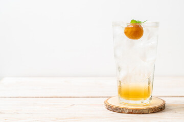 iced plum juice with soda and peppermint