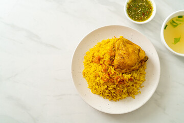 Chicken Biryani or Curried rice and chicken - Thai-Muslim version of Indian biryani, with fragrant yellow rice and chicken