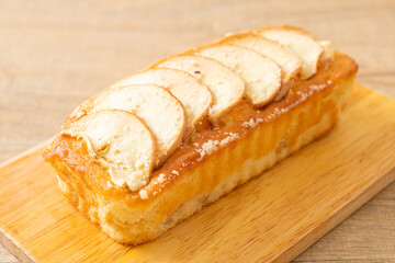 apple loaf crumbled on wood board