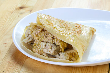 Pancake with chicken and onion
