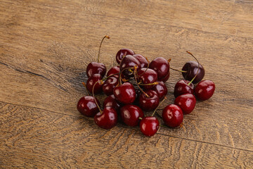 Ripe sweet cherry berries heap