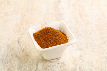 Dry Paprika powder in the bowl