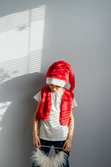 Fototapeta premium child in santa claus hat