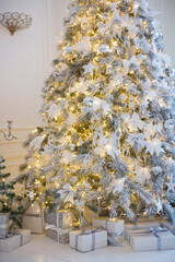 White Christmas tree with decorations