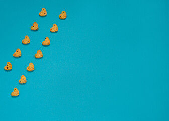 blue background with cookies. Copy space