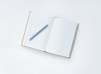 notebook and pen on a white background, top view. 
