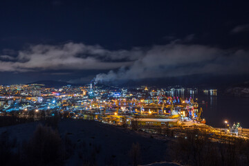 Fototapeta na wymiar Night view from the hill to the port of Murmansk. Murmansk, Russia.