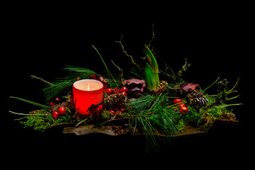 Floral christmas arrangement isolated on black background