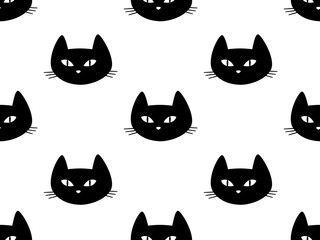 Seamless pattern with muzzles of black cats on a white background.