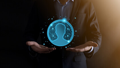 Businessman holding on hand icon of user man,woman low poly polygon style. Internet icons interface foreground. global network media concept.