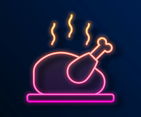 Glowing neon line Roasted turkey or chicken icon isolated on black background. Vector