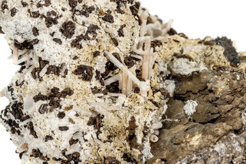 Macro stone Pyrite mineral in rock on a white background