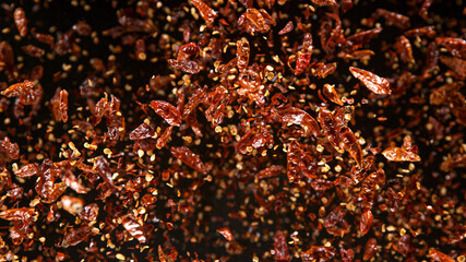 Freeze Motion Shot of Rotating Red Peppers. Top shot.