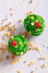 Unique green cupcakes in the shape of Christmas tree.