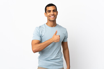 Fototapeta premium African American man over isolated white background giving a thumbs up gesture
