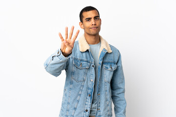 African American man over isolated white background happy and counting four with fingers