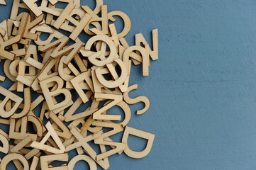 stack of wooden alphabet letters