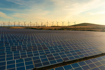 Solar panels and wind turbines generating renewable energy for green and sustainable future.