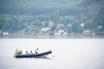 Inflatable dingy life rescue boat moored at marina