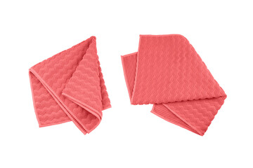 Red folded microfiber towel set isolated on white background, top view.