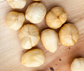 dried hazelnutsnuts on a wooden table