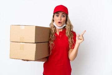 Food delivery Brazilian woman isolated on white background intending to realizes the solution while lifting a finger up
