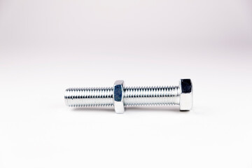 Large bolt with nut on a white background. Big size