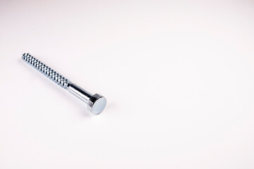 Large screw on white background, free space