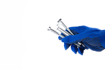 Hand gesture. Hand holds bolt and screws on white background. Hand in construction glove