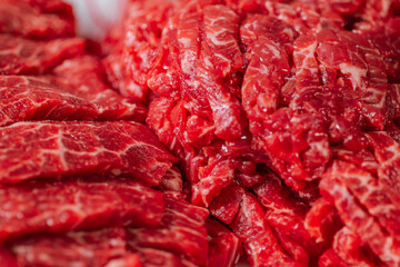 fresh raw beef meat on black table