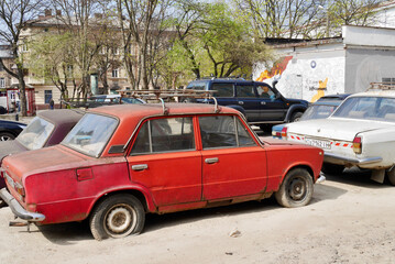Lviv, Ukraine, 6.04.2019. Colorful vintage cars in the streets of Lviv.