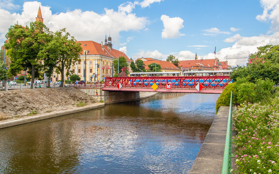 Wroclaw, Poland - crossed by the Oder River, Wroclaw displays a large number of colorful bridges, which are a main landmark of the town. Here in particular a typical iron bridge