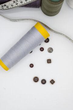 Stitching Material, Measurement Type, Thread Coan, Buttons.  