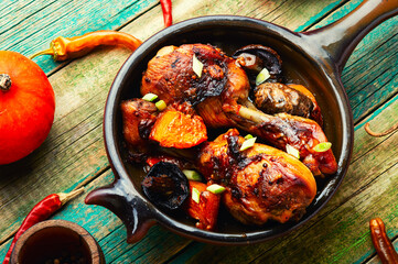 Chicken legs in soy sauce with pumpkin