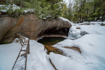 The Basin in Franconia Notch State Park during winter . New Hampshire mountains. USA - obrazy, fototapety, plakaty