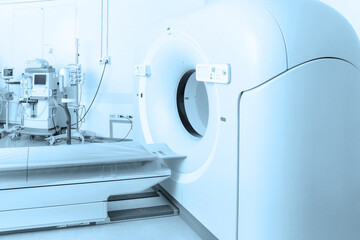 Medical CT or MRI Scan in the modern hospital laboratory. Interior of radiography department. Technologically advanced equipment in white room. Magnetic resonance diagnostics machine.