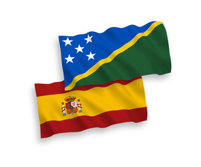 Flags of Solomon Islands and Spain on a white background