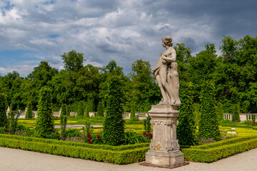 Fototapeta na wymiar beautiful royal garden of Willanow Palace in english style with antique statues Warsaw Poland