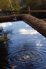 Water drops from the ancient wells at Ancient Monterano with with clean fresh drinking water.Canale Monterano,Italy.Historical and   Archaeological 