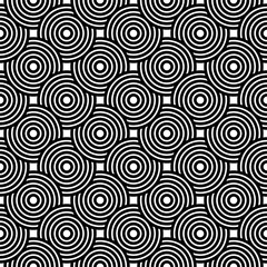 Fototapeta na wymiar Abstract circle seamless black and white pattern background ornament of striped concentric circles.