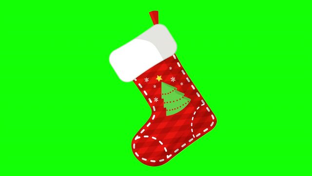 4K Decorative ornaments Christmas Sock. Isolated on Chroma Key green screen Moving Decorative Christmas Sock with Snowflakes Decorations. Rotating Christmas stocking sock design element.
