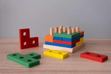 children's wooden educational game, puzzle, constructor. wooden cubes - obrazy, fototapety, plakaty