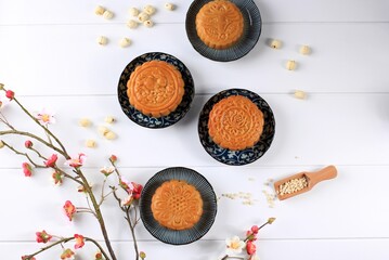 Mooncake Chinese Traditional Pastry on White Table, Copy Space for Text
