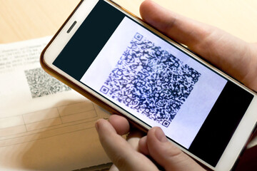 QR code and smartphone, vaccination against coronavirus
