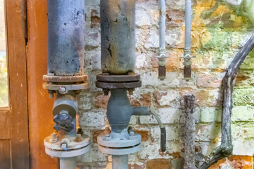 Fototapeta premium Part of the pipeline and water supply system of the greenhouse to maintain climatic conditions